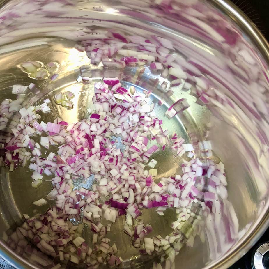 red onion and garlic in pot