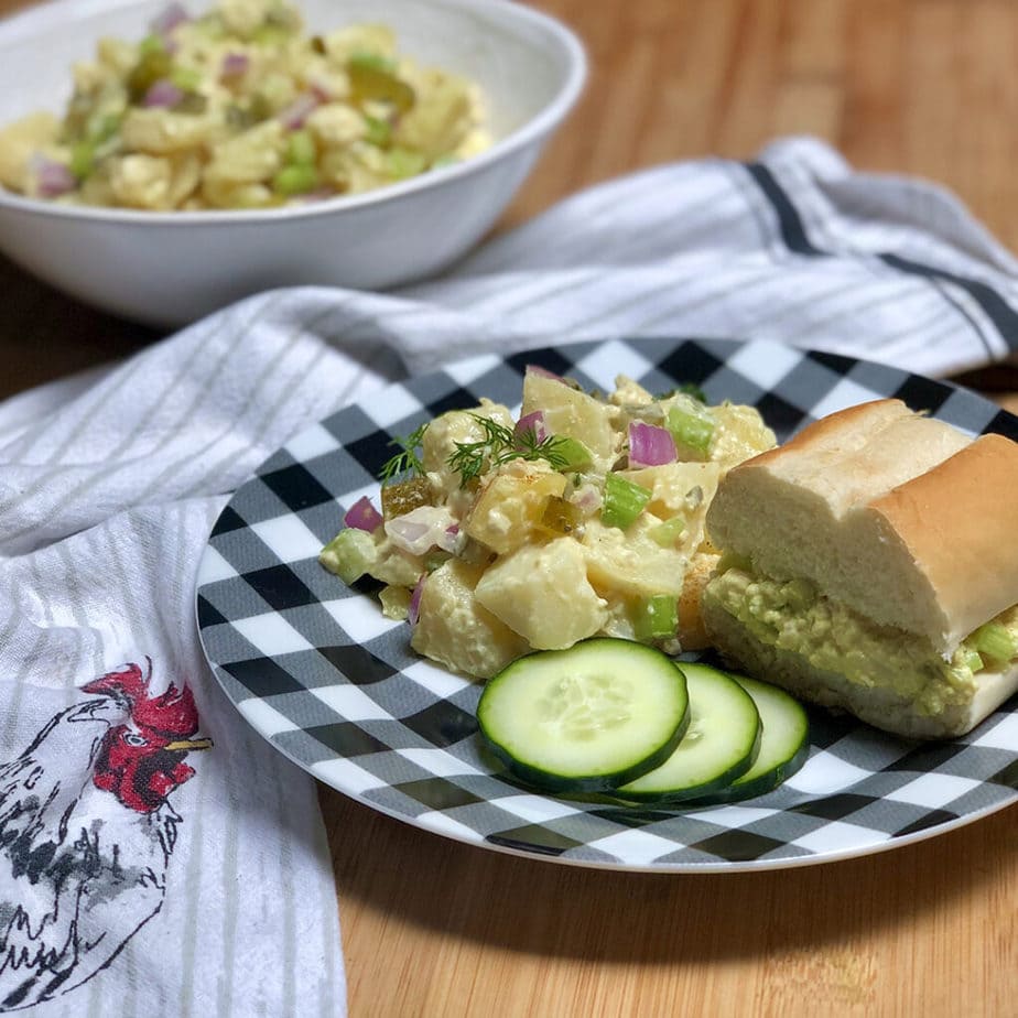 grandma's old fashioned vegan potato salad and egg sandwich on plate