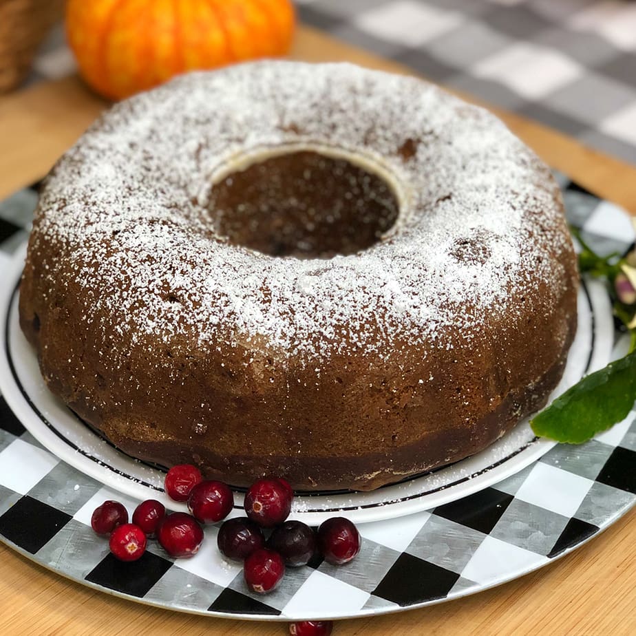 Old fashioned vegan applesauce cake on a tray.