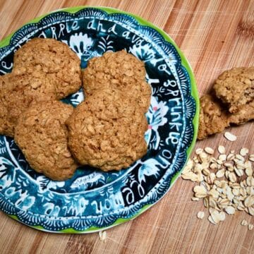 A decorative plate with vegan oatmeal cookies.