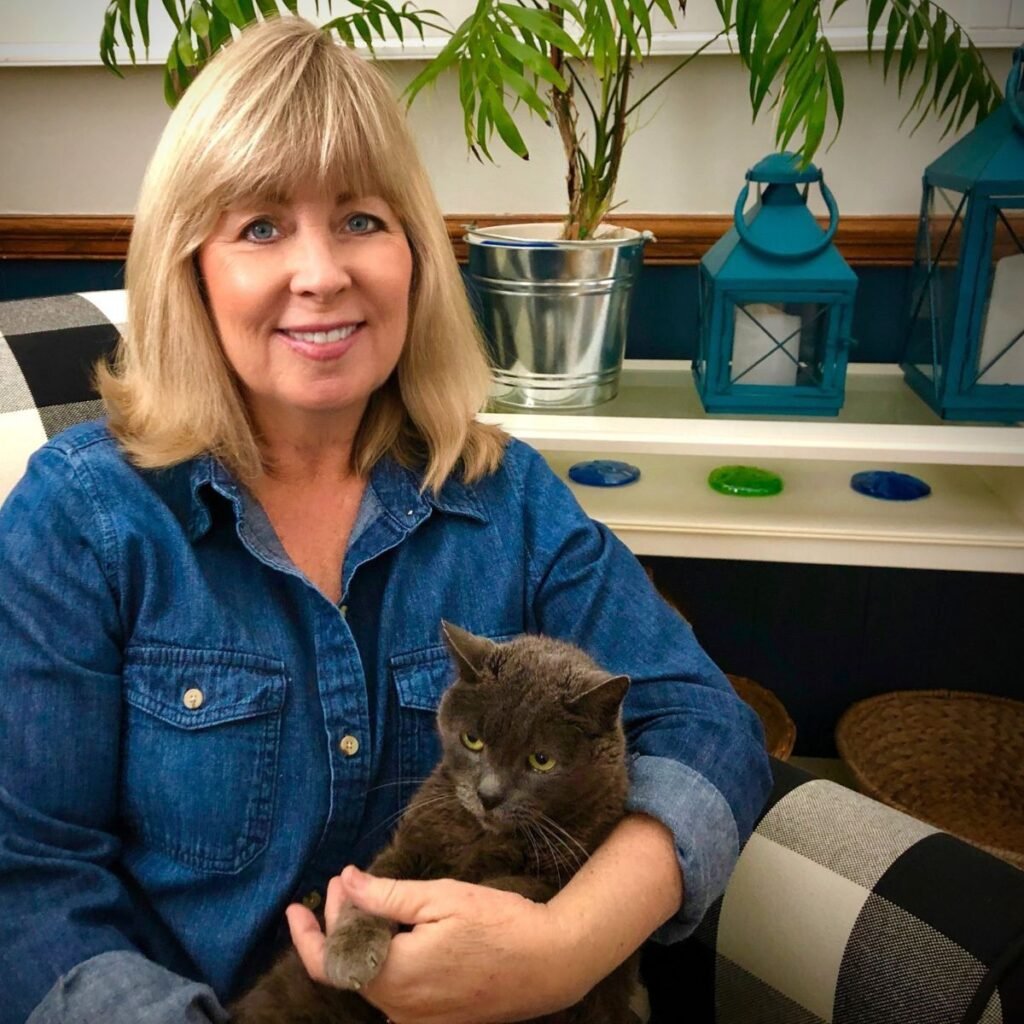 The vegan author Connie Edwards McGaughy and her cat Indigo.