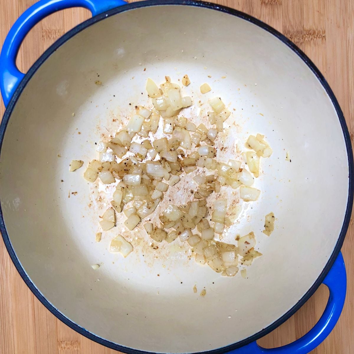Sautéed  onions in a soup pot.