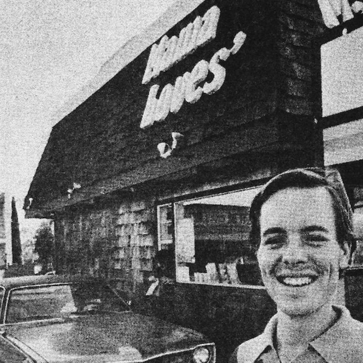 Scott Edwards in front of his drive-thru restaurant Mama Love's in the 1970's.