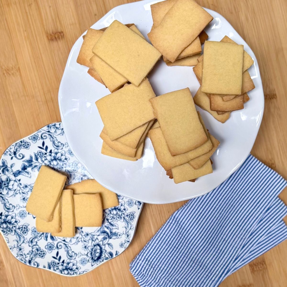 Homemade vegan shortbread cookies on plates.