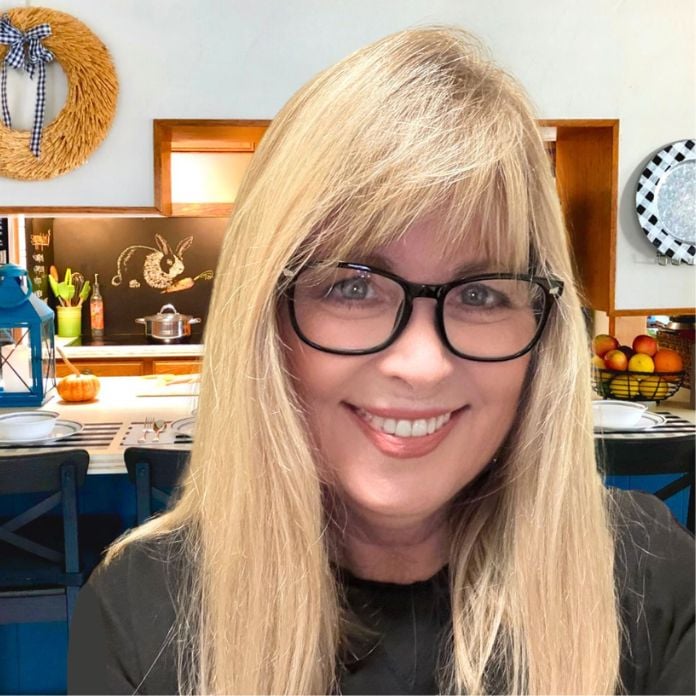 Connie Edwards McGaughy, cookbook author, vegan recipe developer, and founder of The Carrot Underground inside her kitchen in San Diego, California.
