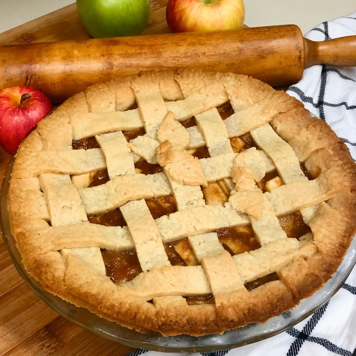 A homemade vegan apple pie with a lattice crust.